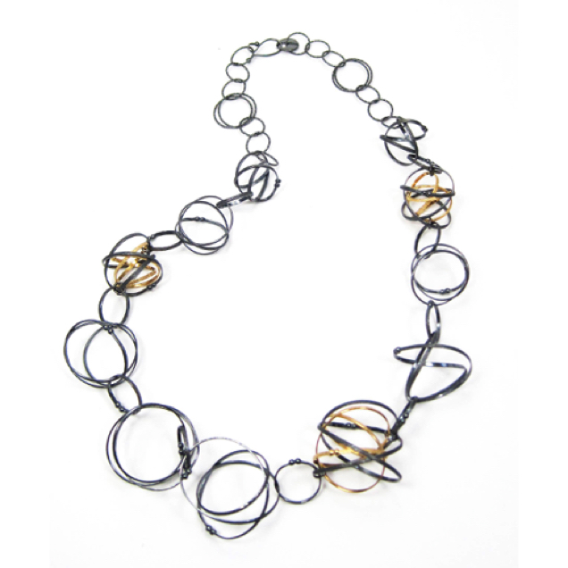 Grand Mobius Necklace 22"
Oxidized Silver & 22K Gold vermeil
NKMB04-G-OX 675. Grand Mobius Necklace 22"
Oxidized Silver & 22K Gold vermeil
NKMB04-G-OX 675.